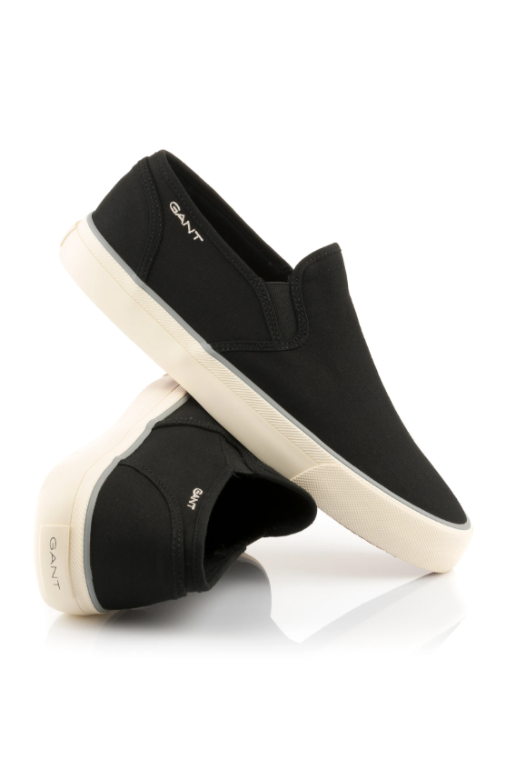 Black slip-on sneakers with a white sole, GANT branding for a casual, minimalist look.