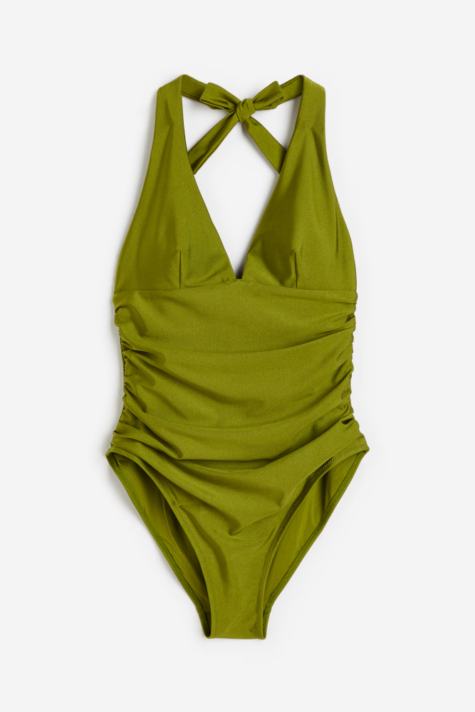 Olive-green halter swimsuit with a plunging V-neck and ruched sides, front view